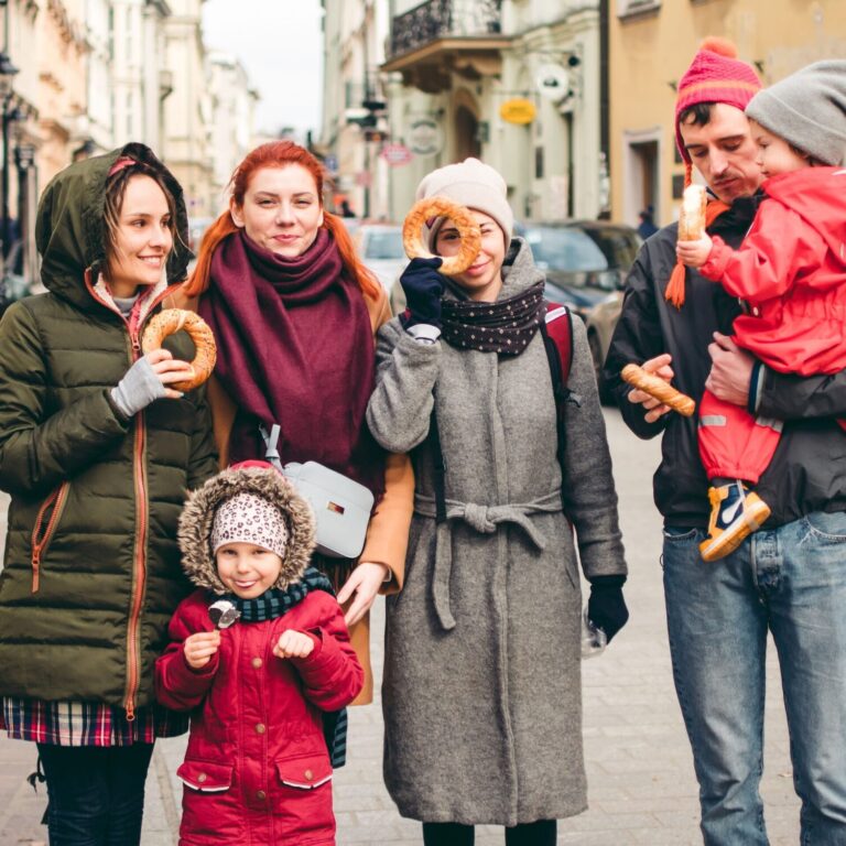 a-group-of-friends-with-kids-in-krakow-try-local-b-2024-12-06-09-53-15-utc